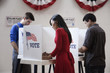Voters voting in polling place