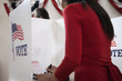 Voters voting in polling place