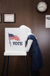 Middle Eastern voter voting in polling place