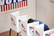 Caucasian voter voting in polling place