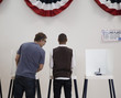 Voters voting in polling place