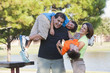 Hispanic family playing in park