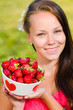 Girl and strawberries
