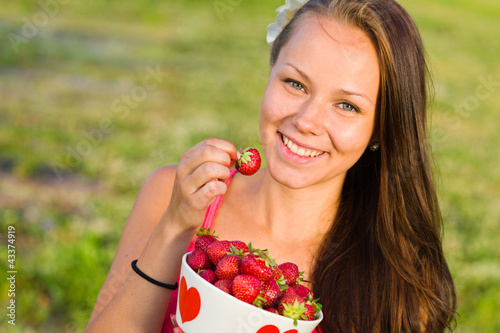 Photo: Girl and strawberries Girl and strawberries