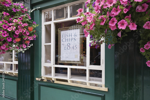 Photo: Flowers decorating pub window Flowers decorating pub window