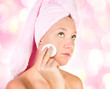   Sweet skincare. Attractive girl applying face pack.