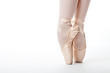 beine eines Teenagers auf Ballettschuhen