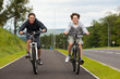 Girl and boy biking