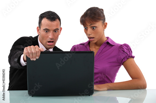 Photo: Shocked business partnership Shocked business partnership