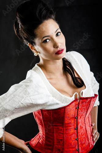 Photo: attractive brunette woman isolated on black attractive brunette woman isolated on black