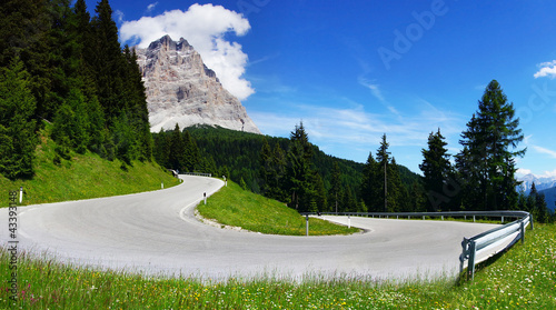 Photo: Dolomites landscape with mountain road. Dolomites landscape with mountain road.