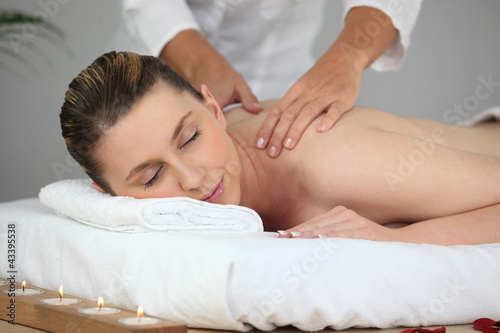 Photo: woman having massage woman having massage