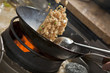 Cooking asian stir fry in wok