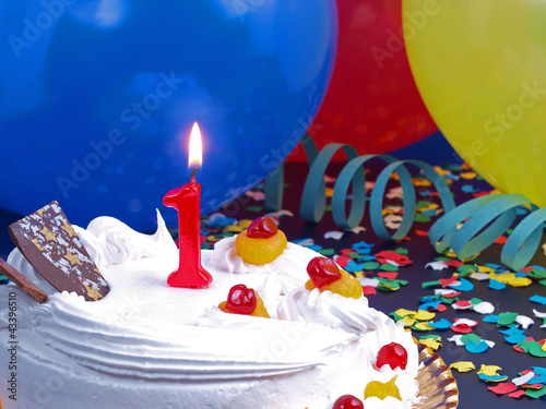 Photo: Birthday cake with red candles showing Nr. 1 Birthday cake with red candles showing Nr. 1