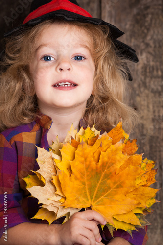 Photo: Kid with autumn leaves Kid with autumn leaves