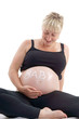 Photo: pregnant woman holding here bare belly pregnant woman holding here bare belly