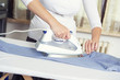Photo: bright picture of lovely housewife with iron bright picture of lovely housewife with iron
