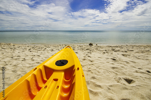 Photo: Paddle boats on white sandy beach and blue sea Paddle boats on white sandy beach and blue sea