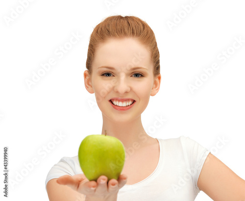 Foto: teenage girl with green apple teenage girl with green apple