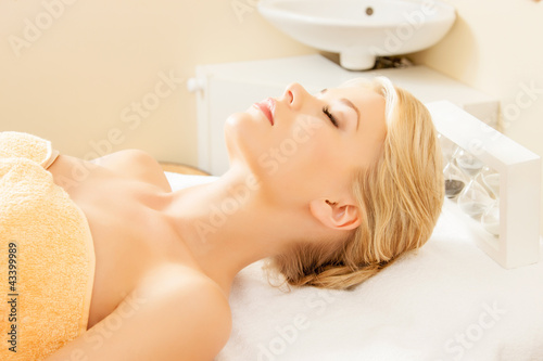 Photo: beautiful woman in spa salon beautiful woman in spa salon