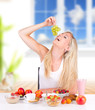 Attractive young woman having healthy breakfast