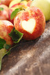 Delicious red apple with heart cutout
