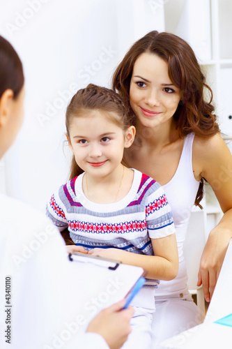 Photo: Little girl and a doctor Little girl and a doctor