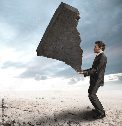Photo: Businessman challenging the difficulties Businessman challenging the difficulties