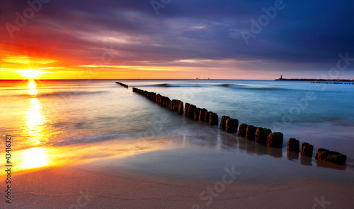  Baltic sea at beautiful sunrise in Poland beach.