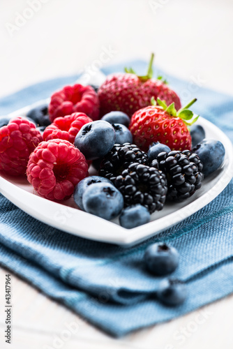 Photo: Various berry fruits on a plate Various berry fruits on a plate