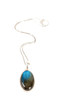 pendant with a blue gemstone