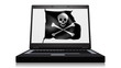 A laptop with a skull and crossbones pirate flag.
