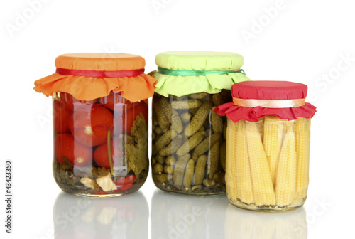 Photo: Jars with canned vegetables isolated on white Jars with canned vegetables isolated on white