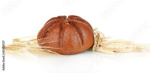 Photo: Homemade whole bread isolated on white background Homemade whole bread isolated on white background