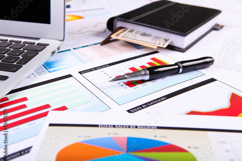 Photo: Financial papers on the table Financial papers on the table