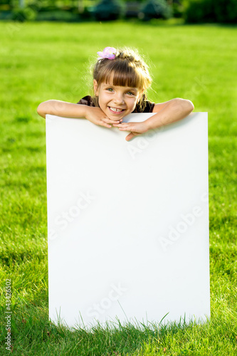Photo: Smiling Little girl Kid in park Smiling Little girl Kid in park