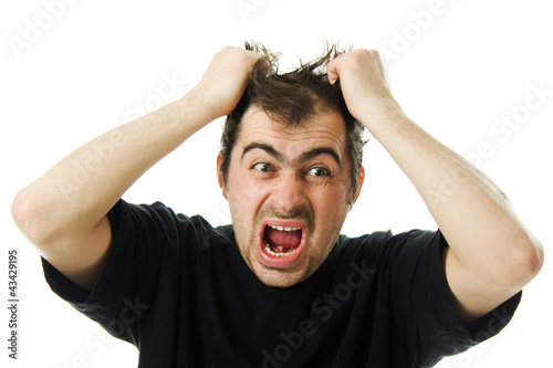 Photo: Screaming from despair a man Screaming from despair a man