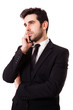 Picture of a pensive young businessman, isolated on white backg