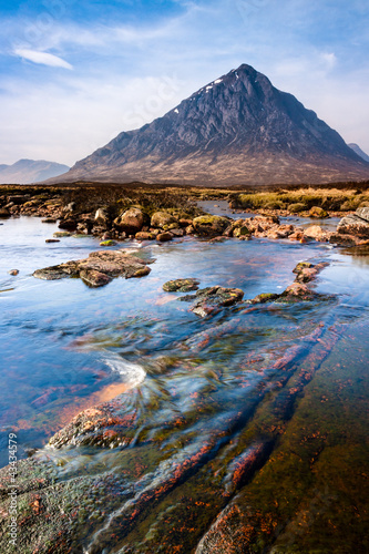 Photo: Scottish highlands landscape scene with mountain and river Scottish highlands landscape scene with mountain and river
