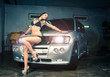 Photo: Model at the car wash in garage. Cross processing Model at the car wash in garage. Cross processing