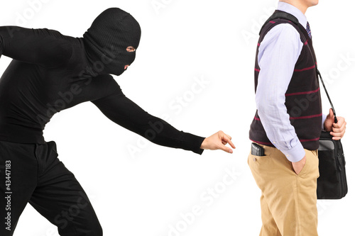Photo: Pickpocket trying to steal a wallet Pickpocket trying to steal a wallet