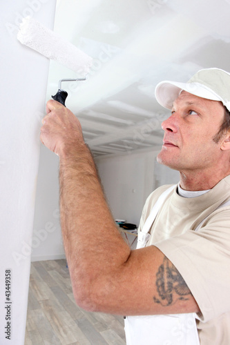 Photo: craftsman painter working craftsman painter working