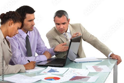 Photo: Market researchers working on a project Market researchers working on a project