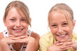 Two cute Girls smiling, isolated