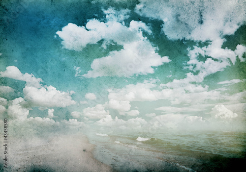 Photo: grunge background with clouds and sea view grunge background with clouds and sea view