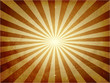 Distressed light burst vector background