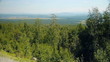 Man hiking and  looking at summer view
