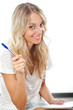 Photo: blonde woman holding pen and notepad blonde woman holding pen and notepad