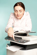 Businesswoman with copier