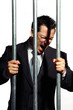 very good looking office manager is screaming behind prison bars